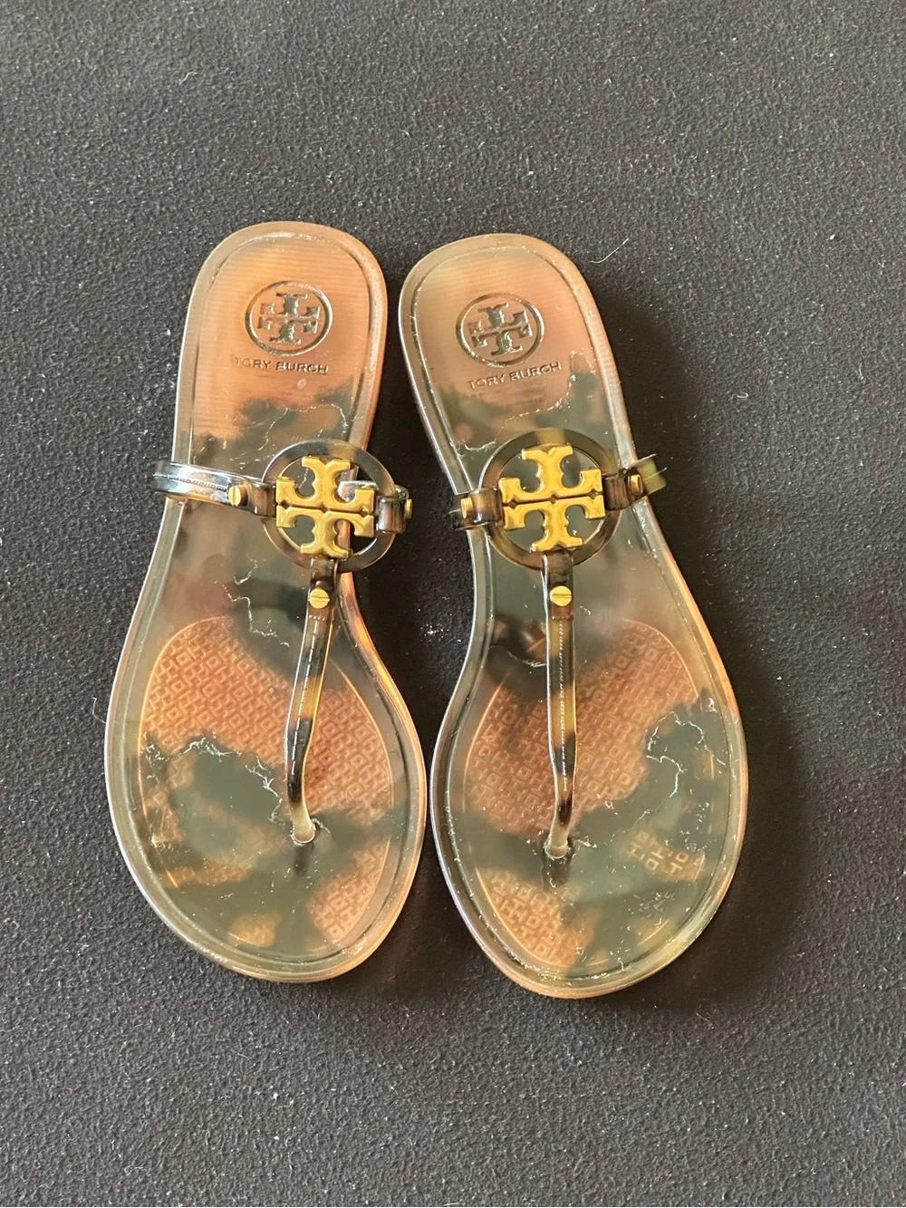 Tory Burch Jelly Thong Sandals in tortoiseshell.